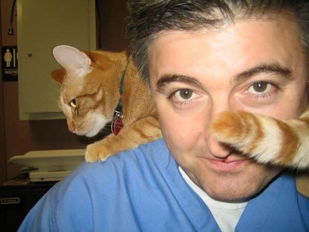 Edvin and an orange cat